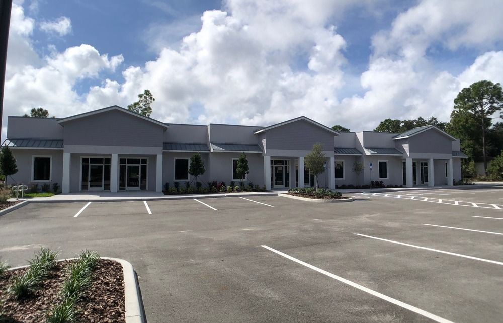 Elite Plaza | Office Condos For Sale or Lease: 3821 Woodbriar Trail, Port Orange, FL 32129